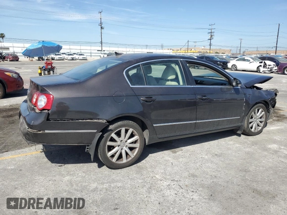 2010 Volkswagen Passat Komfort with VIN WVWJK7ANXAE129739, listed as a Copart auction lot 57798275 with 155,830 mi miles and Salvage title. Bid and sale history available at DreamBid. Image 3.