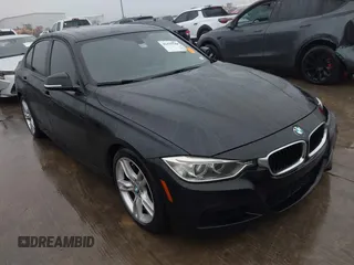 2014 BMW 3 Series 335i with VIN WBA3A9C57EF477662, listed as a IAAI auction lot 41435544 with 129,543 mi miles. Bid and sale history available at carsss.com. Image 1.