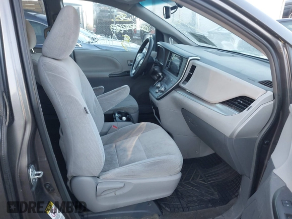 2015 Toyota Sienna LE AAS with VIN 5TDKK3DC2FS678943, listed as a IAAI auction lot 41184022 with 161,120 mi miles. Bid and sale history available at carsss.com. Image 5.