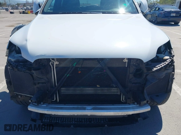 2015 Audi Q7 3.0T S line Prestige with VIN WA1DGAFE0FD027782, listed as a IAAI auction lot 41856552 with 116,563 mi miles. Bid and sale history available at carsss.com. Image 6.