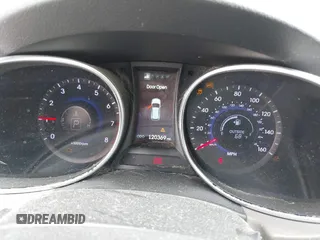 2015 Hyundai Santa Fe z VIN 5XYZW4LA9FG283826, wystawiony jako IAAI lot #42289253 z przebiegiem 120 369 mil mil oraz . Historia ofert i sprzedaży dostępna na DreamBid. Obrazek 7.