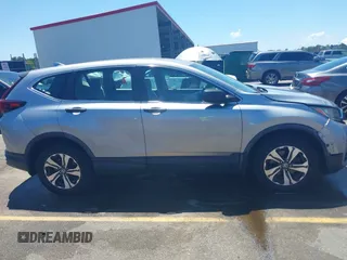 2020 Honda CR-V LX with VIN 7FARW1H26LE002413, listed as a IAAI auction lot 42318905 with 63,698 mi miles and . Bid and sale history available at DreamBid. Image 13.