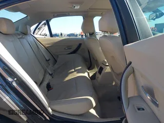 2014 BMW 3 Series 328i with VIN WBA3C1C57EK116483, listed as a IAAI auction lot 42697759 with 113,010 mi miles and . Bid and sale history available at DreamBid. Image 8.