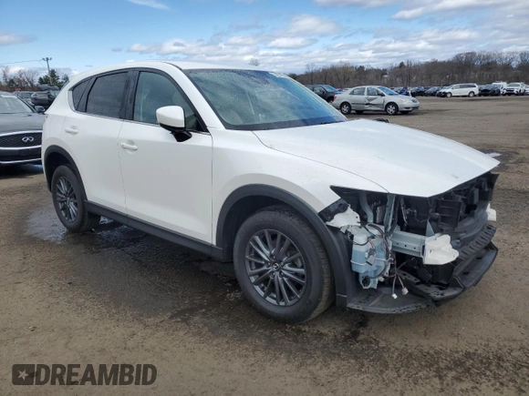 2020 Mazda CX-5 Touring with VIN JM3KFBCM8L0868020, listed as a Copart auction lot 53257795 with 74,189 mi miles and Salvage Title. Bid and sale history available at carsss.com. Image 4.