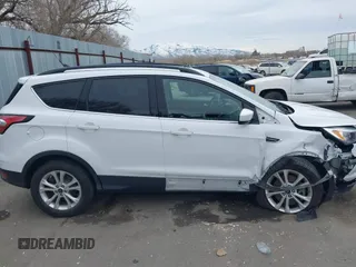 2018 Ford Escape SE z VIN 1FMCU9GD0JUC62783, wystawiony jako IAAI lot #41488153 z przebiegiem 55 774 mil mil oraz . Historia ofert i sprzedaży dostępna na DreamBid. Obrazek 13.