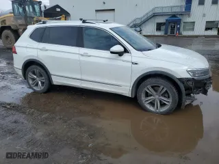 2018 Volkswagen Tiguan SEL Premium with VIN 3VV4B7AX9JM124512, listed as a Copart auction lot 50399315 with 131,983 mi miles and Salvage Title. Bid and sale history available at carsss.com. Image 4.