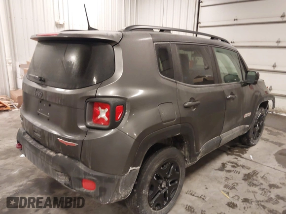 2018 Jeep Renegade Trailhawk with VIN ZACCJBCB7JPG85967, listed as a IAAI auction lot 41611403 with 70,073 mi miles. Bid and sale history available at carsss.com. Image 4.