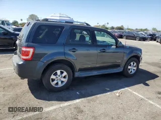 2009 Ford Escape Hybrid with VIN 1FMCU493X9KB03901, listed as a Copart auction lot 52353675 with 145,444 mi miles and Salvage title. Bid and sale history available at DreamBid. Image 3.