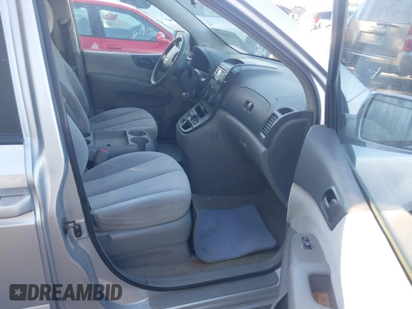 2006 Kia Sedona LX with VIN KNDMB233366032380, listed as a IAAI auction lot 42196919 with 132,336 mi miles. Bid and sale history available at carsss.com. Image 5.