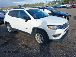 2019 Jeep Compass Latitude with VIN 3C4NJDBB8KT742273, listed as a IAAI auction lot 41160958 with 75,688 mi miles. Bid and sale history available at carsss.com. Image 1.