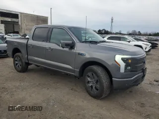2024 Ford F-150 Lightning Lariat with VIN 1FT6W5L79RWG19060, listed as a Copart auction lot 43415085 with 2,733 mi miles and Salvage title. Bid and sale history available at DreamBid. Image 4.