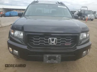 2014 Honda Ridgeline Sport with VIN 5FPYK1F72EB001352, listed as a Copart auction lot 57824745 with 54,409 mi miles and Salvage title. Bid and sale history available at DreamBid. Image 5.