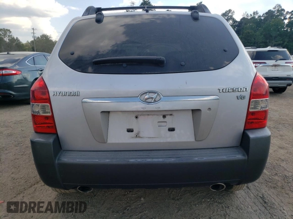 2005 Hyundai Tucson GLS with VIN KM8JN12DX5U212587, listed as a Copart auction lot 72044114 with 128,993 mi miles and Salvage Title. Bid and sale history available at carsss.com. Image 6.
