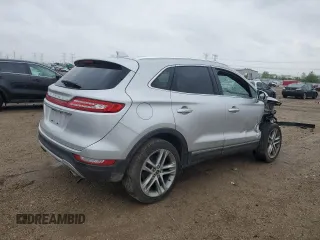 2019 Lincoln MKC Reserve with VIN 5LMCJ3D95KUL22724, listed as a Copart auction lot 56861795 with 59,275 mi miles and Salvage title. Bid and sale history available at DreamBid. Image 3.