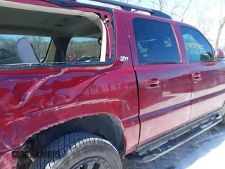 2004 Chevrolet Suburban Z71 with VIN 3GNFK16Z84G231091, listed as a IAAI auction lot 41595885 with 101,243 mi miles. Bid and sale history available at carsss.com. Image 13.
