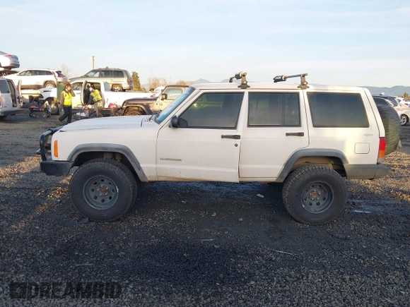 2000 Jeep Cherokee z VIN 1J4FF28P6YL132738, wystawiony jako IAAI lot #41382855 z przebiegiem 196 213 mil mil oraz . Historia ofert i sprzedaży dostępna na DreamBid. Obrazek 14.