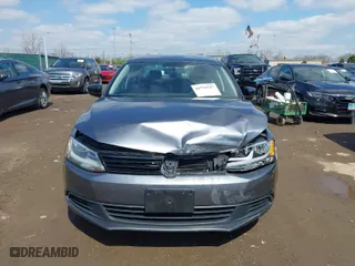 2014 Volkswagen Jetta Sedan S with VIN 3VW2K7AJ7EM422108, listed as a IAAI auction lot 41924347 with 76,584 mi miles. Bid and sale history available at carsss.com. Image 6.
