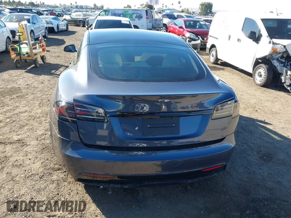2023 Tesla Model S with VIN 5YJSA1E5XPF500341, listed as a IAAI auction lot 40756406 with 11,583 mi miles and . Bid and sale history available at DreamBid. Image 17.