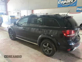 2015 Dodge Journey Crossroad with VIN 3C4PDDGGXFT725744, listed as a Copart auction lot 60808455 with 210,141 mi miles and Salvage title. Bid and sale history available at DreamBid. Image 2.
