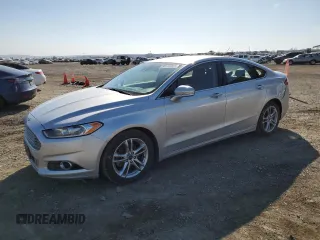 2016 Ford Fusion Titanium Hybrid with VIN 3FA6P0RU5GR206927, listed as a Copart auction lot 50180945 with 126,780 mi miles and Salvage title. Bid and sale history available at DreamBid. Image 1.