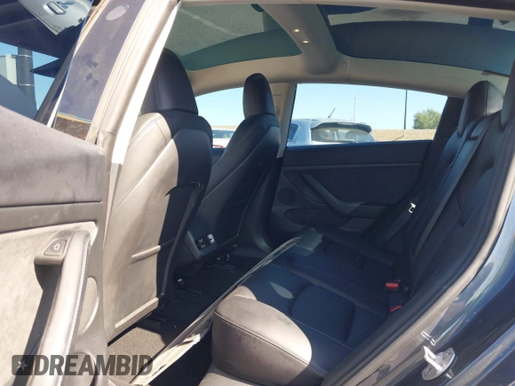 2023 Tesla Model 3 with VIN 5YJ3E1EA2PF640289, listed as a IAAI auction lot 42000200 with 14,194 mi miles and . Bid and sale history available at DreamBid. Image 8.