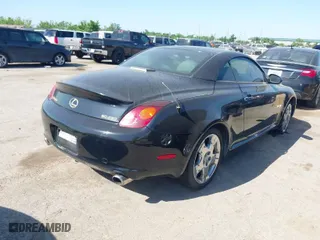 2004 Lexus SC 430 with VIN JTHFN48Y540053505, listed as a IAAI auction lot 41981873 with 144,553 mi miles. Bid and sale history available at carsss.com. Image 4.