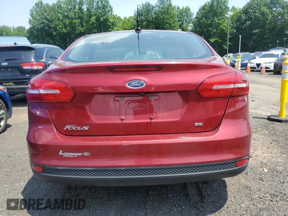 2016 Ford Focus SE with VIN 1FADP3F2XGL296408, listed as a Copart auction lot 61555595 with 155,685 mi miles and Clean title. Bid and sale history available at DreamBid. Image 6.