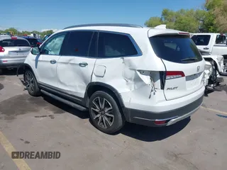 2021 Honda Pilot Touring 8-Passenger z VIN 5FNYF6H94MB087593, wystawiony jako IAAI lot #42153310 z przebiegiem 30 400 mil mil oraz . Historia ofert i sprzedaży dostępna na DreamBid. Obrazek 3.