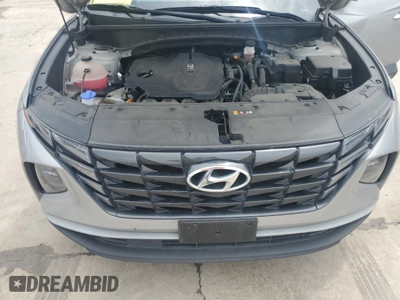 2022 Hyundai Tucson SEL z VIN 5NMJF3AE9NH061420, wystawiony jako Copart lot #54492445 z przebiegiem 39 868 mil mil oraz Szkoda całkowita • Salvage title. Historia ofert i sprzedaży dostępna na DreamBid. Obrazek 12.