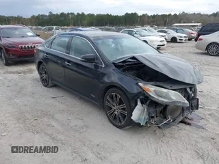 2015 Toyota Avalon Limited with VIN 4T1BK1EB9FU152858, listed as a IAAI auction lot 41717674 with 235,931 mi miles and . Bid and sale history available at DreamBid. Image 1.