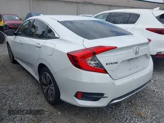 2020 Honda Civic LX with VIN 2HGFC2F64LH593100, listed as a IAAI auction lot 41877572 with 76,713 mi miles and . Bid and sale history available at DreamBid. Image 3.