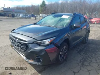2024 Subaru Crosstrek Premium z VIN JF2GUADC3RH204109, wystawiony jako IAAI lot #41800147 z przebiegiem 31 619 mil mil oraz . Historia ofert i sprzedaży dostępna na DreamBid. Obrazek 2.