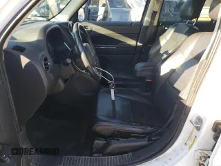 2011 Jeep Patriot Latitude X with VIN 1J4NF4GB4BD239057, listed as a Copart auction lot 85320574 with 180,792 mi miles and Salvage Title. Bid and sale history available at DreamBid. Image 7.