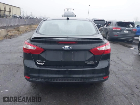 2014 Ford Focus Titanium with VIN 1FADP3J24EL439065, listed as a IAAI auction lot 40868973 with 167,739 mi miles. Bid and sale history available at carsss.com. Image 16.