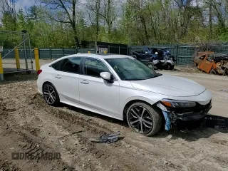 2022 Honda Civic Touring z VIN 2HGFE1F91NH313585, wystawiony jako Copart lot #56042115 z przebiegiem 30 954 mil mil oraz Szkoda całkowita • Salvage title. Historia ofert i sprzedaży dostępna na DreamBid. Obrazek 14.