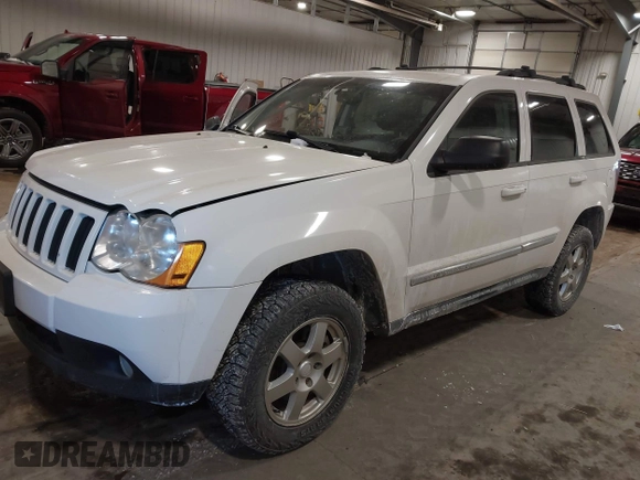 2010 Jeep Grand Cherokee Laredo with VIN 1J4PR4GK7AC126059, listed as a IAAI auction lot 41599058 with 154,192 mi miles. Bid and sale history available at carsss.com. Image 18.