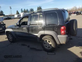 2003 Jeep Liberty Sport with VIN 1J4GK48KX3W658457, listed as a Copart auction lot 41863855 with 194,747 mi miles and Salvage Title. Bid and sale history available at DreamBid. Image 2.