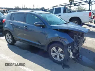 2011 Kia Sportage LX with VIN KNDPB3A23B7137650, listed as a IAAI auction lot 41979477 with 243,186 mi miles and . Bid and sale history available at carsss.com. Image 1.