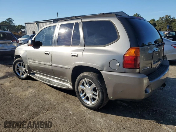 2006 GMC Envoy Denali with VIN 1GKES63M962257466, listed as a Copart auction lot 76821124 with 171,266 mi miles and Salvage Title. Bid and sale history available at carsss.com. Image 2.