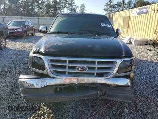 1999 Ford F-150 XL with VIN 2FTRX07W0XCA08082, listed as a Copart auction lot 82246214 with 189,950 mi miles and Salvage title. Bid and sale history available at DreamBid. Image 5.