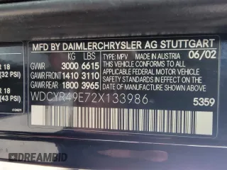 2002 Mercedes-Benz G-Class with VIN WDCYR49E72X133986, listed as a Copart auction lot 54624435 with 138,597 mi miles and Salvage Title. Bid and sale history available at carsss.com. Image 10.
