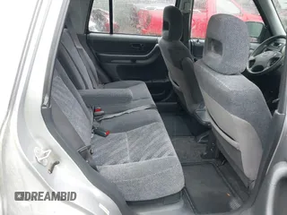 2001 Honda CR-V LX with VIN JHLRD28441C000682, listed as a IAAI auction lot 42019317 with 214,884 mi miles. Bid and sale history available at carsss.com. Image 8.