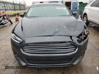 2015 Ford Fusion SE z VIN 3FA6P0H71FR302337, wystawiony jako Copart lot #42409805 z przebiegiem 156 783 mil mil oraz Szkoda całkowita • Salvage title. Historia ofert i sprzedaży dostępna na DreamBid. Obrazek 5.