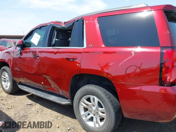 2018 Chevrolet Tahoe LT with VIN 1GNSKBKC6JR215585, listed as a IAAI auction lot 42043898 with 85,730 mi miles and . Bid and sale history available at DreamBid. Image 14.