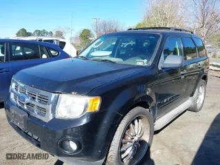 2009 Ford Escape XLT with VIN 1FMCU93G49KD15671, listed as a IAAI auction lot 41751527 with 208,697 mi miles. Bid and sale history available at carsss.com. Image 2.