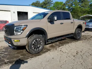2021 Nissan Titan Pro-4X z VIN 1N6AA1EDXMN518285, wystawiony jako Copart lot #50193605 z przebiegiem 44 781 mil mil oraz Szkoda całkowita • Salvage title. Historia ofert i sprzedaży dostępna na DreamBid. Obrazek 1.