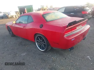 2011 Dodge Challenger z VIN 2B3CJ4DGXBH561850, wystawiony jako IAAI lot #41139802 z przebiegiem 155 948 mil mil oraz . Historia ofert i sprzedaży dostępna na DreamBid. Obrazek 3.