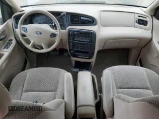2003 Ford Windstar SE with VIN 2FMDA52413BB59104, listed as a Copart auction lot 55134805 with 132,918 mi miles and Salvage title. Bid and sale history available at DreamBid. Image 8.