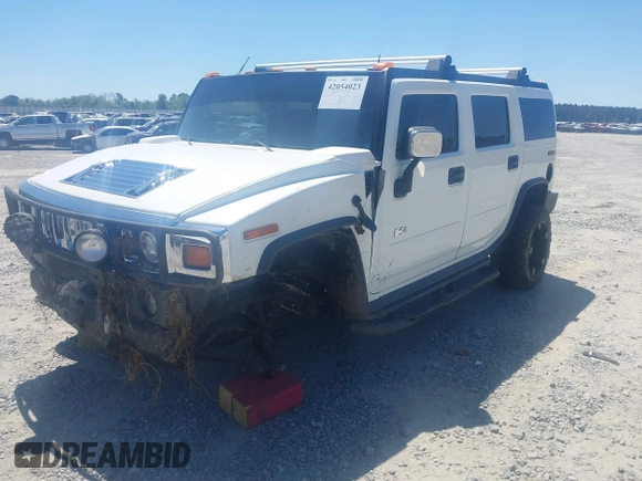 2003 Hummer H2 z VIN 5GRGN23U53H102215, wystawiony jako IAAI lot #42054023 z przebiegiem 222 170 mil mil oraz . Historia ofert i sprzedaży dostępna na DreamBid. Obrazek 2.