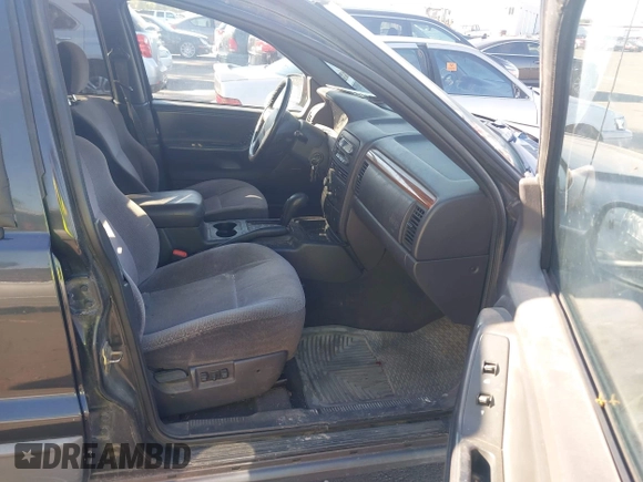 1999 Jeep Grand Cherokee Laredo with VIN 1J4GW58S0XC538913, listed as a IAAI auction lot 42684467 with 241,252 mi miles and . Bid and sale history available at DreamBid. Image 5.
